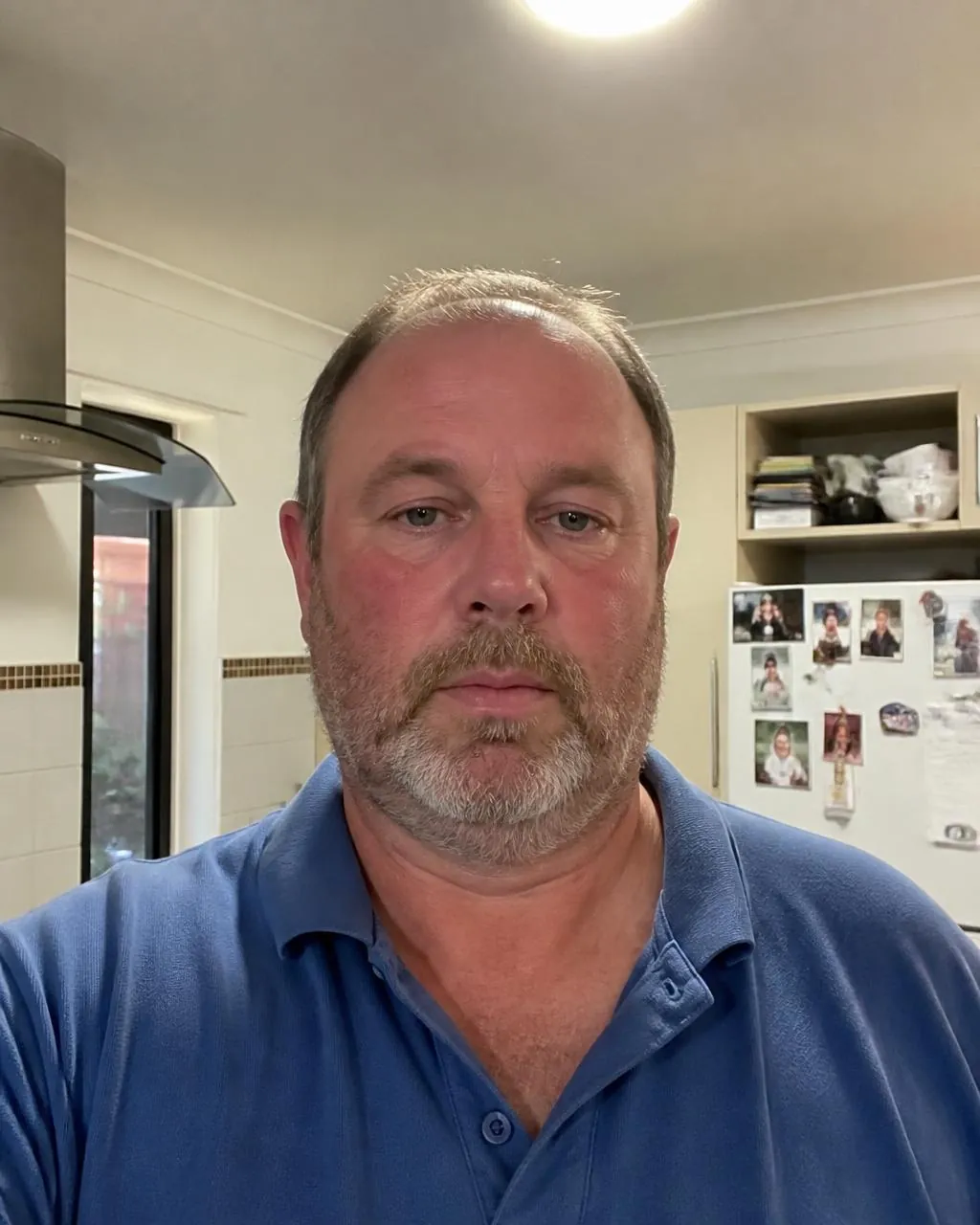 Everyday photo of an older Aussie bloke in a polo shirt